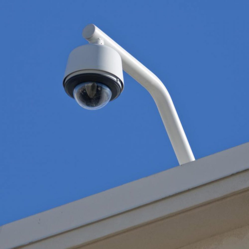 security-camera-against-blue-sky